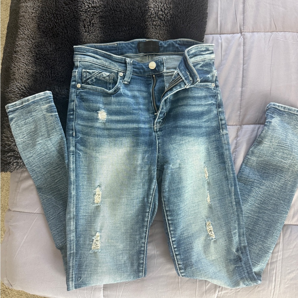 Buckle Light Blue Distressed Skinny Jeans